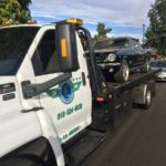 Los Angeles Towing service towing a black mustang