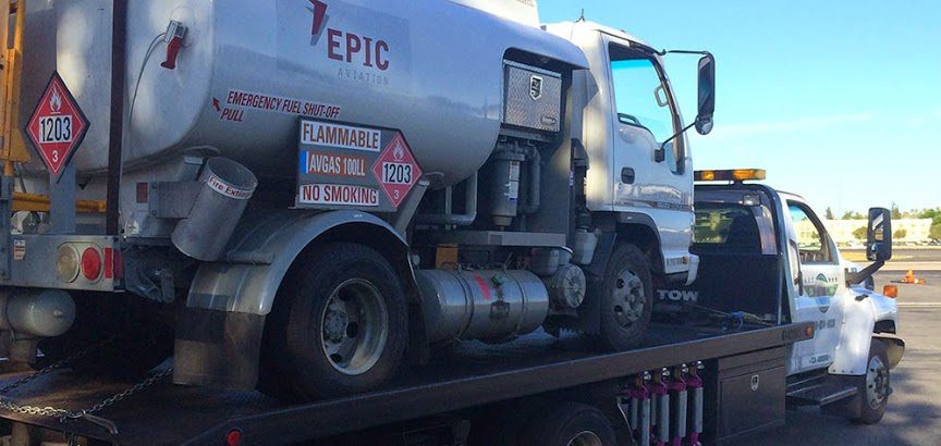 Gas-or-fuel-delivery-San-Fernando-Valley A truck with a cement tanker on the back of it.