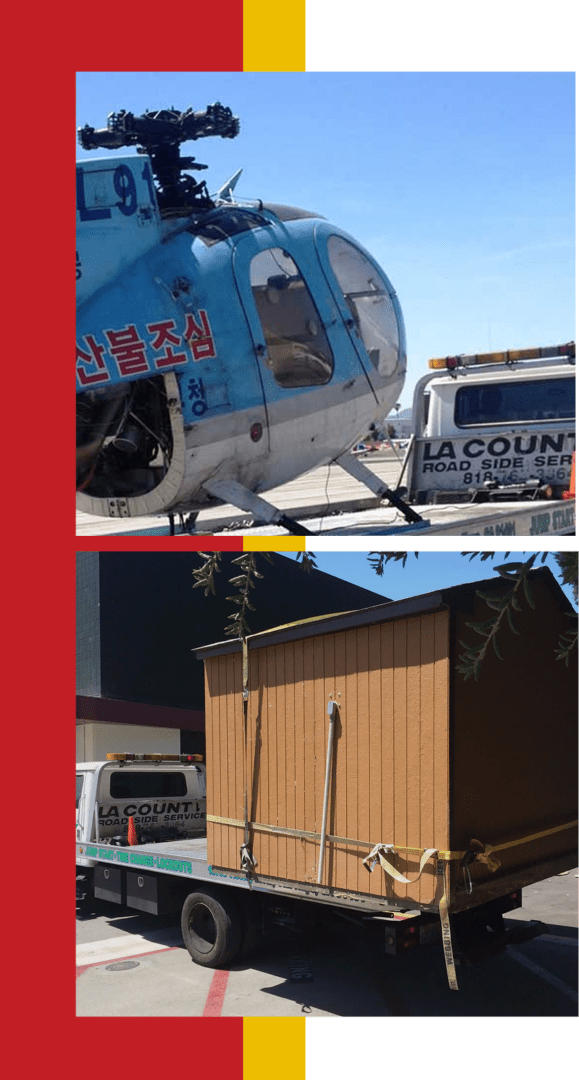 Helicopter and shed transported by trucks.