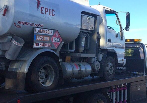 Heavy-Duty-towing-Los-Angeles A truck with a cement tanker on the back of it.