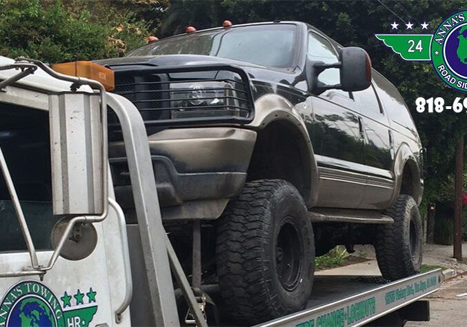 When-You-Should-Call-for-Toluca-Lake-Towing A truck is being towed by a tow truck.