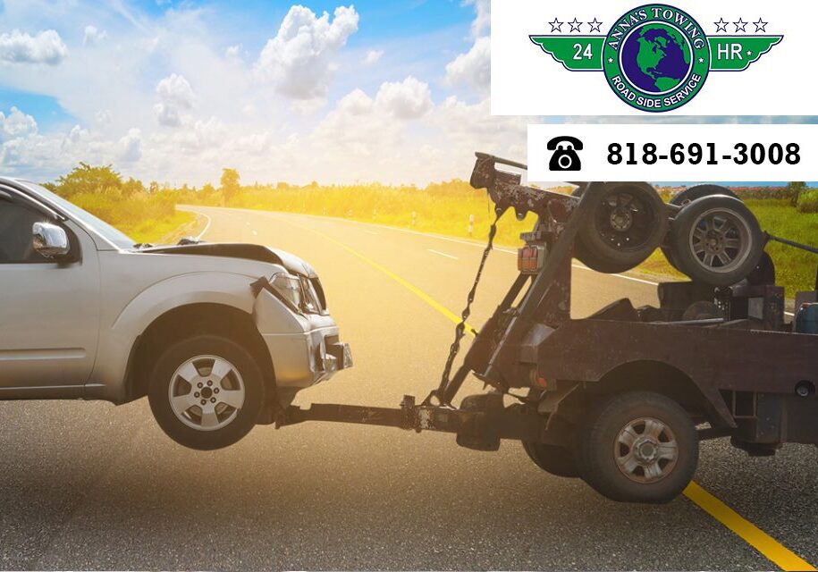 Where-to-Turn-for-Non-Emergency-Sherman-Oaks-Towing A tow truck towing a car on the side of a road.